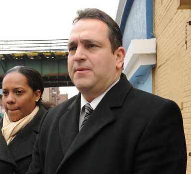 State Senator Hiram Monserrate speaks with Council Member Elect Julissa Ferreras (L) during a press conference calling for an emergency investigation of Con Edison following two seperate manhole explosions in Jackson Heights and Elmhurst.   Original Filename: Monserrate Presser 5.jpg