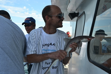 Adam also caught a baby shark. 