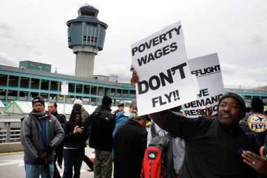 Airport workers protest at LGA