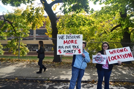 Residents protest the homeless shelter.