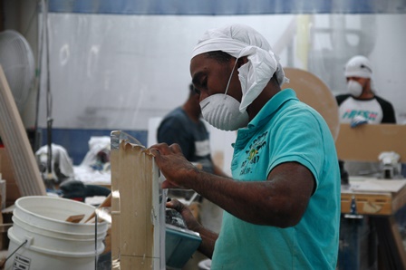 Plexi-Craft worker