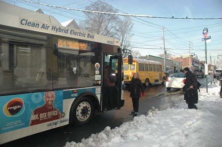 Residents about to board the Q54