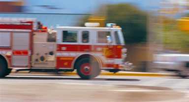 FireTruckInMotionHC0509_L_300_C_R-624×422