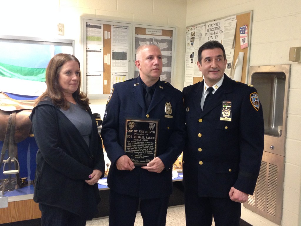Sergeant Michael Salice was named "Cop of the Month" in the 107th Precinct meeting which also saw the community warned about increased enforcement for speeding violations. Salice was instrumental in diffusing a recent home invasion. (THE COURIER/Photo by Alina Suriel)