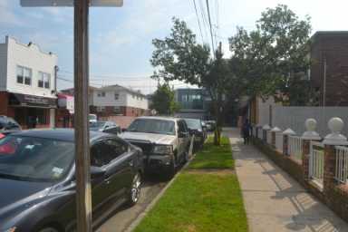 Several major airline carriers at JFK are working with two local elected officials to eliminate parking problems near the airport.