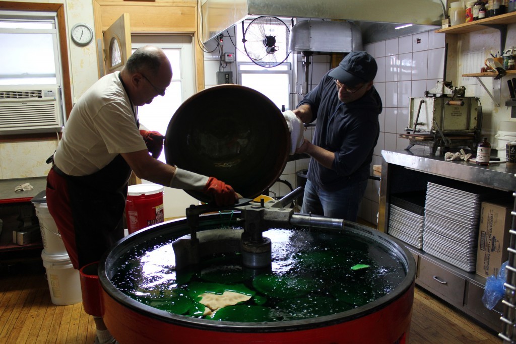 Peter Aigner and Mark Libertini creating a batch of the shop’s best-selling marzipan.