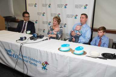 Dr. Nicholas Bastidas along with Suzanne O'Shea Faeth, Michael Faeth, twins Gavin and Liam Faeth and their older brother, Thomas Rademaker.