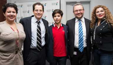 Adrian Ehrler (center) had his life saved through emergency tracheal surgery performed at Cohen Children's Hospital in New Hyde Park.
