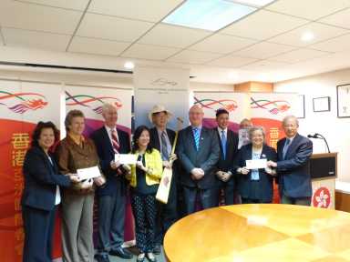 Representatives from HSBC, the Chinatown YMCA, Flushing Bank, Queens Botanical Garden and DCH Auto with organizers of the Hong Kong Dragon Boat Festival.