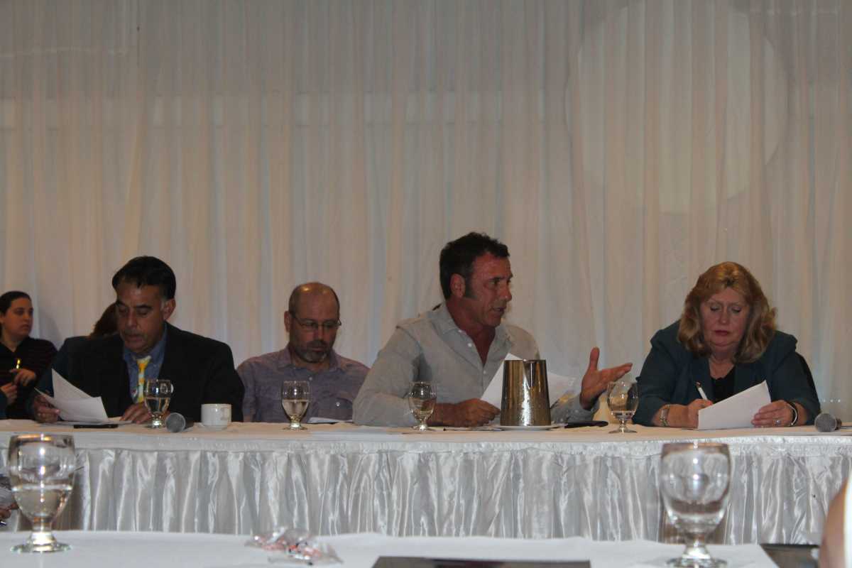 Community Board 1 members discussed concerns about the city's new zoning proposal to create more affordable and senior housing.