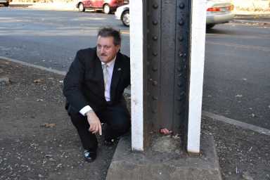 State Senator Joseph Addabbo at the underpass at Yellowstone Boulevard and Kessel Street.