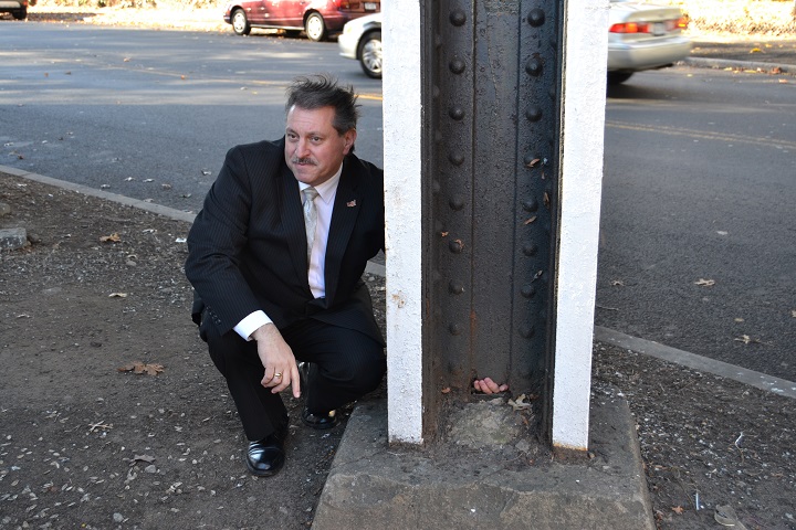 State Senator Joseph Addabbo at the underpass at Yellowstone Boulevard and Kessel Street.