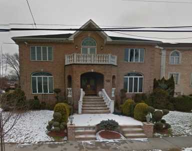 The suspect fatally beat his mother and submerged her head underwater in their Bayside home.
