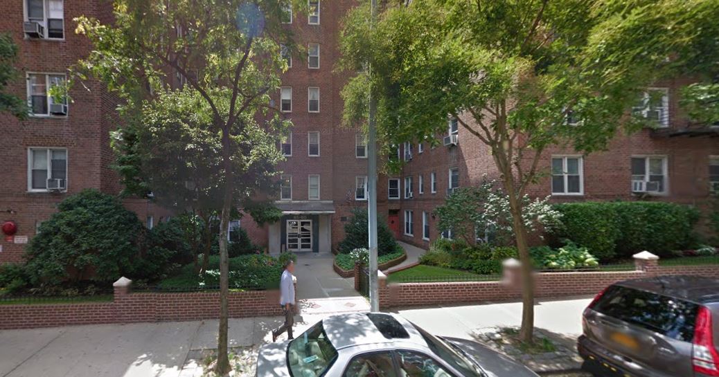 Police found a cache of weapons and ammunition inside an apartment in this Rego Park building this week.