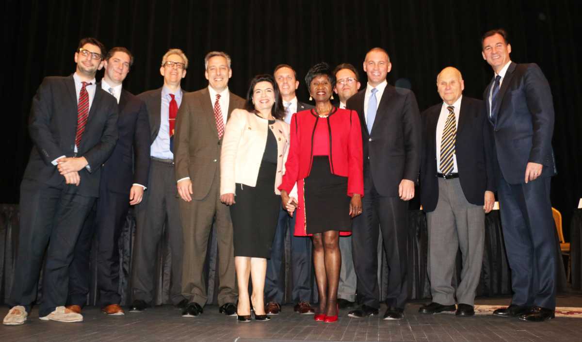 Candidates for Steve Israel's Third Congressional District seat join the moderators and members of North Shore Towers for a debate last Thursday.