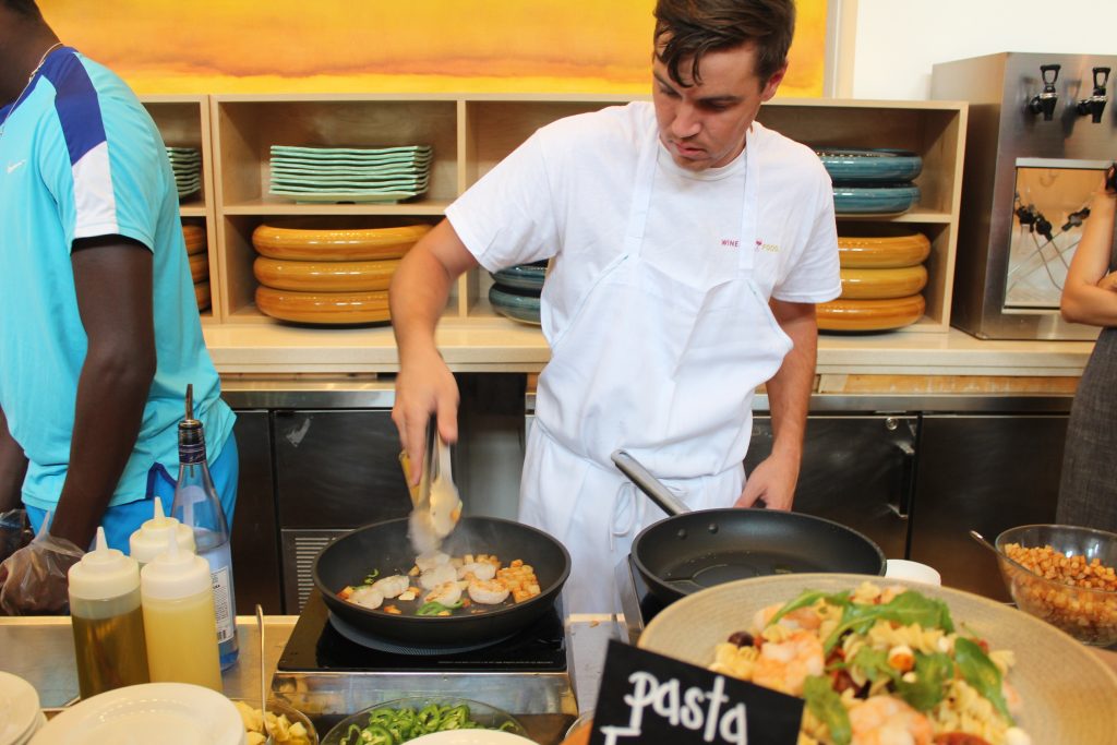CHEF MAKING OUZO SHRIMP