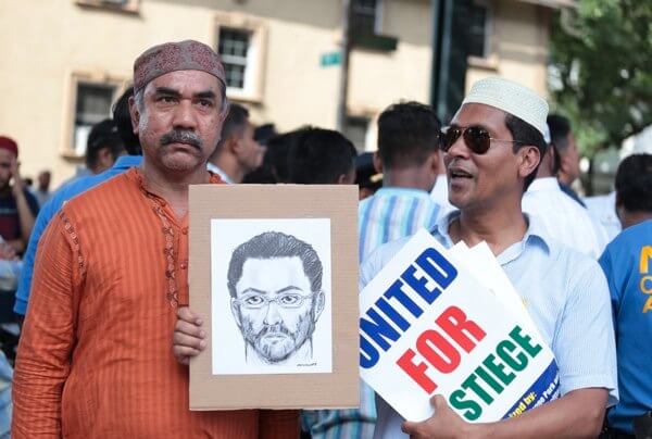 Man charged with murder of imam and associate