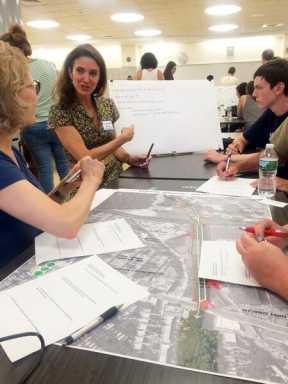 Residents debate merits of Queensway vs. railway