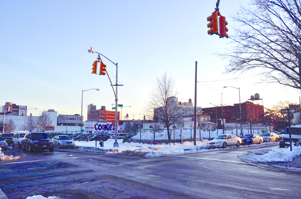 This February 2010 photo shows the parking lot at the corner of 168th Street and 90th Avenue that the Greater Jamaica Development Corporation wants developed into a new retail and residential complex.