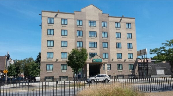 Homeless families sheltered at Woodside motel without notice from city