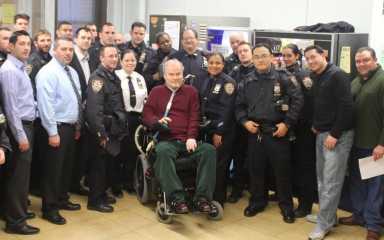 Detective Steven McDonald (center) was known to share his survival story with fellow officers across the city, including at the 110th Precinct.