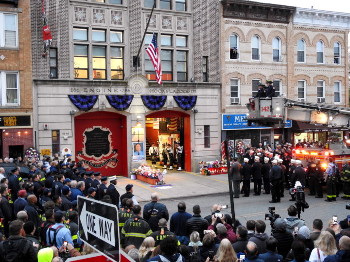 Black and purple bunting adorns the headquarters of Engine Co. 286/Ladder Co. 135 on Myrtle Avenue in Glendale during a ceremony on April 21.