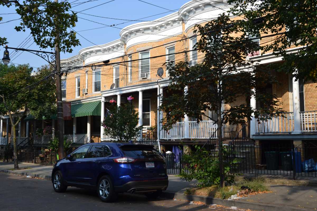A tree-lined block of Stockholm Street in Ridgewood.