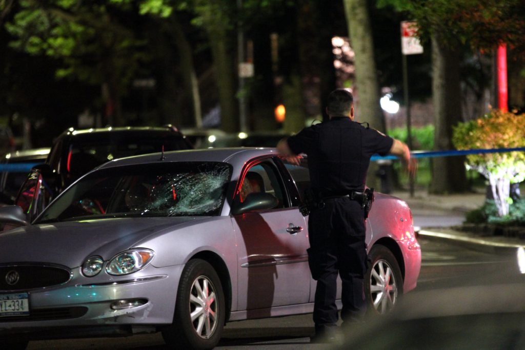 Police question the driver following the accident.