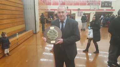 Flushing native returns to coaching after health scare