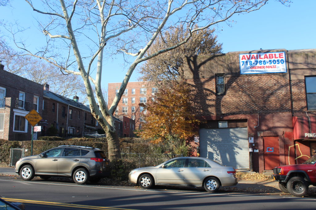 The building overlooks homes in the Sunnyside Gardens community.