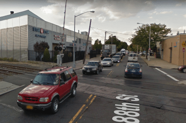 Traffic on 88th Street near the Long Island Rail Road crossing in Glendale.