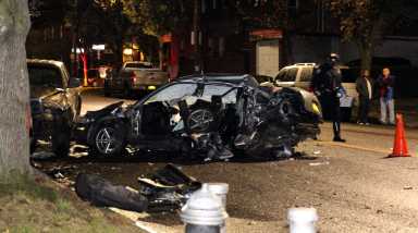 Police continue to investigate a deadly car crash in Ozone Park on Nov. 18.