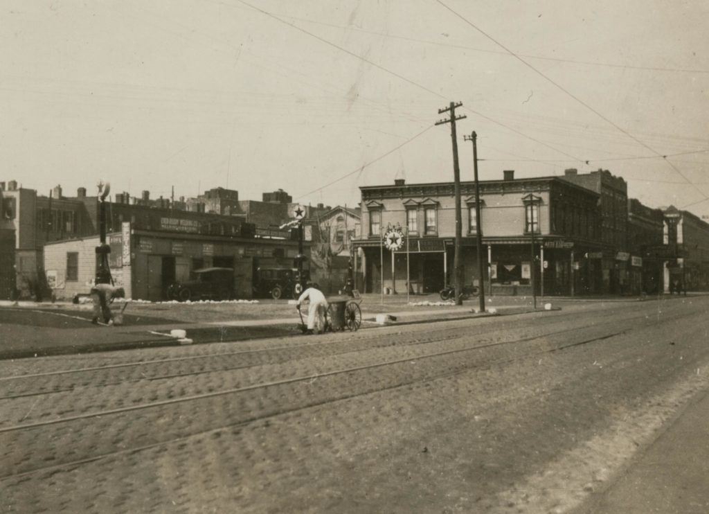 This April 1923 photo shows Myrtle Avenue looking west from 65th Street in Glendale (photo via Queens Library Digital Archives)