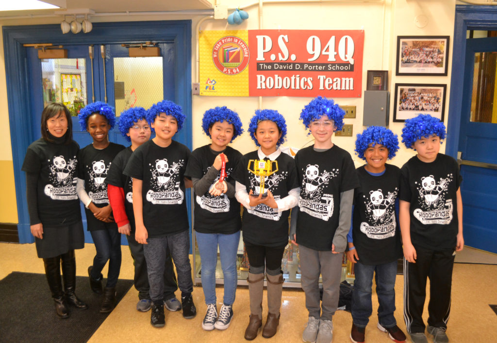 The RoboPandas and coach, Ellie Glus