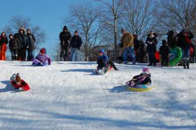 Sledding at Juniper Valley Park following a winter storm in February 2013.