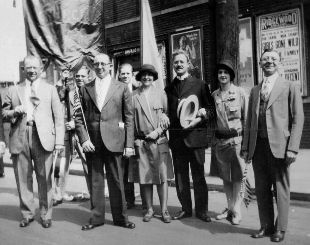 American flags and church banners were carried proudly during the Anniversary Day parade in Ridgewood in 1929. (Ridgewood Times/courtesy of Greater Ridgewood Historical Society)