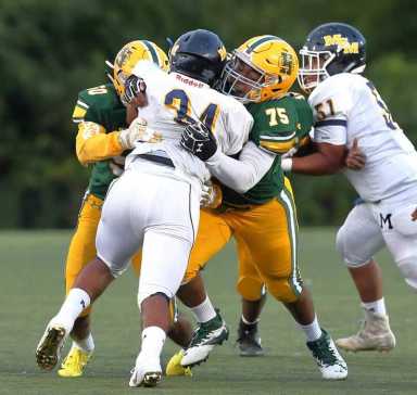 Holy Cross football drops OT thriller