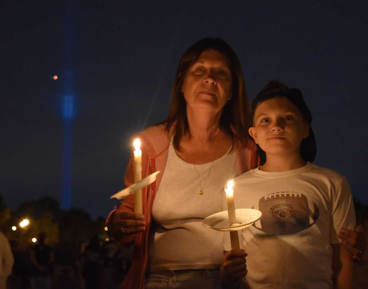 Last year's 9/11 memorial at Juniper Valley Park in Middle Village, with the Tribute in Light seen in the background.