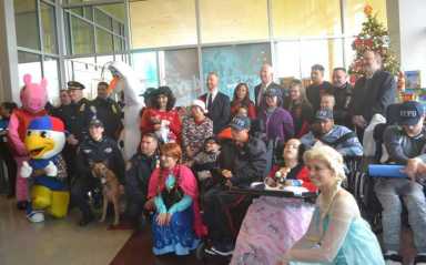 Police Commissioner, NYPD spread holiday cheer at St. Mary’s Hospital for Children in Bayside