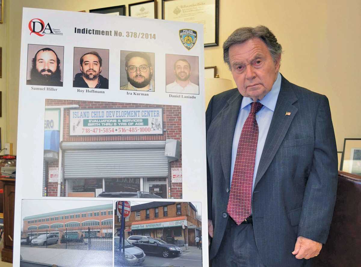 Queens District Attorney Richard A. Brown announcing a fraud arrest in 2014.