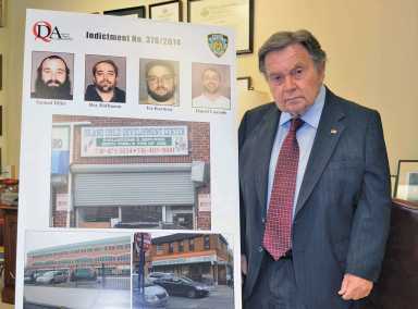 Queens District Attorney Richard A. Brown announcing a fraud arrest in 2014.