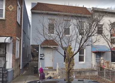 The 40th Street home in Sunnyside where a 42-year-old man was found dead on May 22.