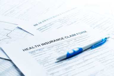 health insurance form, paperwork and questionnaire for insurance concepts