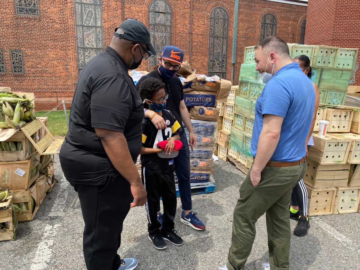 Pastor Young, young volunteer Arlington, Councilman Moya and Speaker Johnson