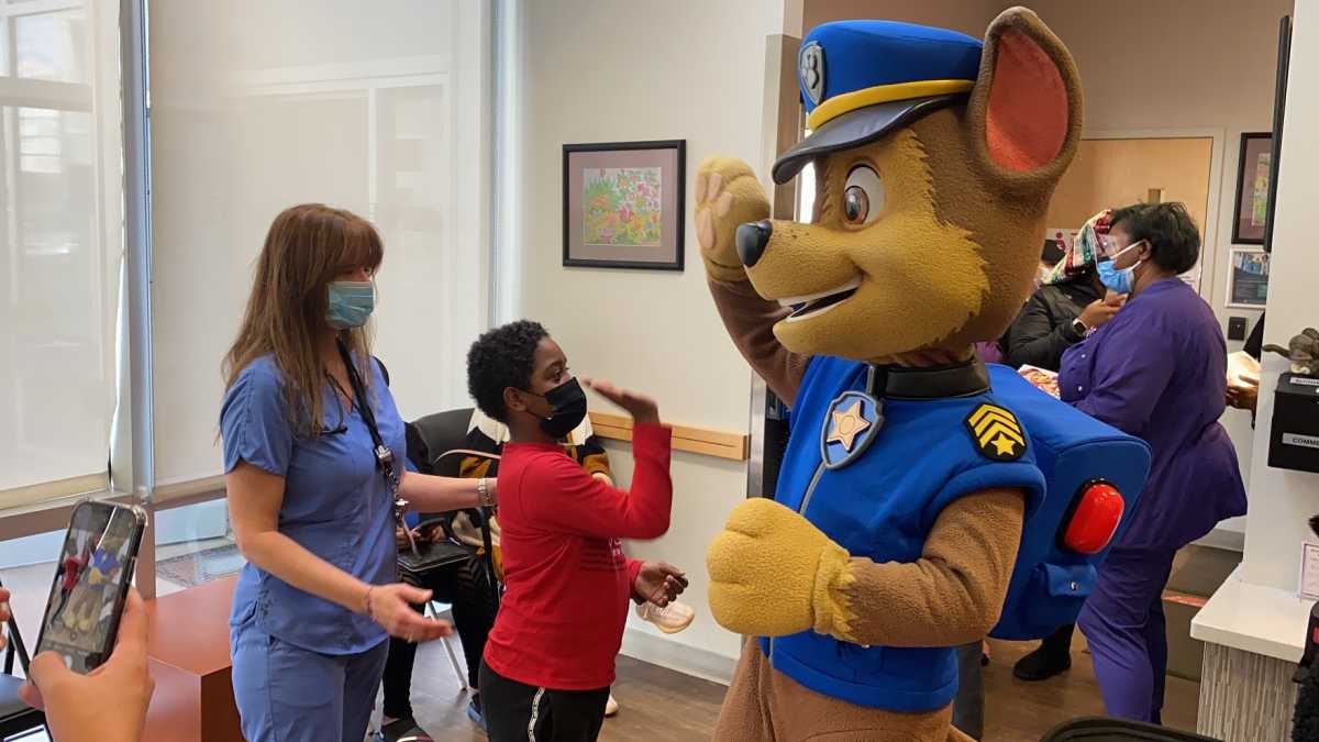 Child with Chase from Paw Patrol