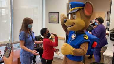 Child with Chase from Paw Patrol