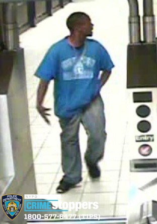 man sought R train assault