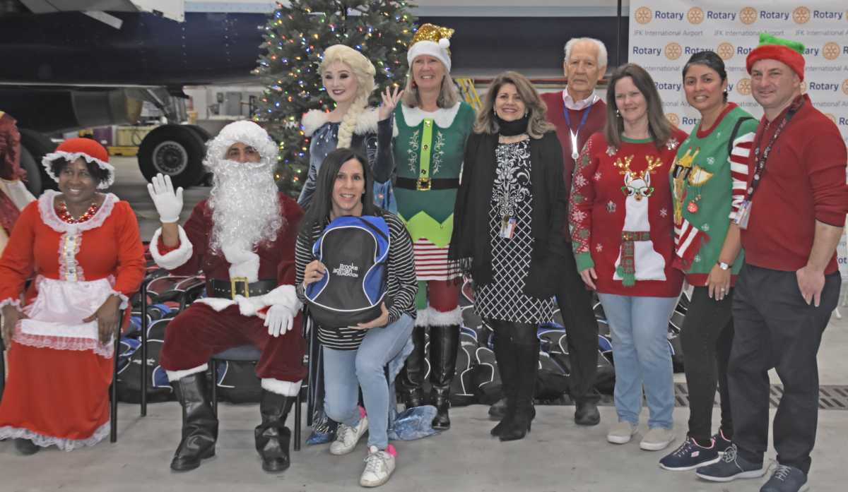 JFK Rotary members with the Clause's