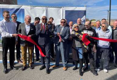 CM 10-24 ribbon cutting