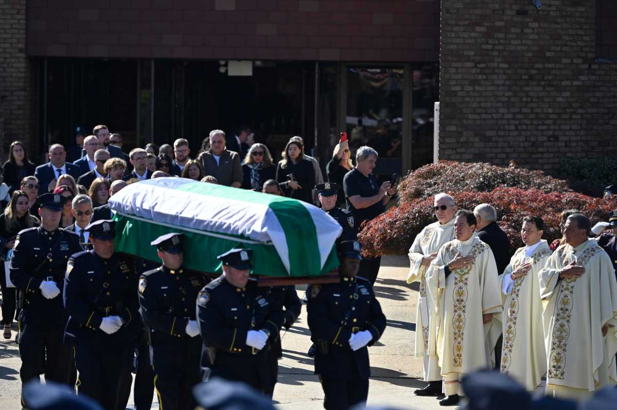 Paul Bears carry the caket of NYPD Crossing Guard Krystyna Naprawa